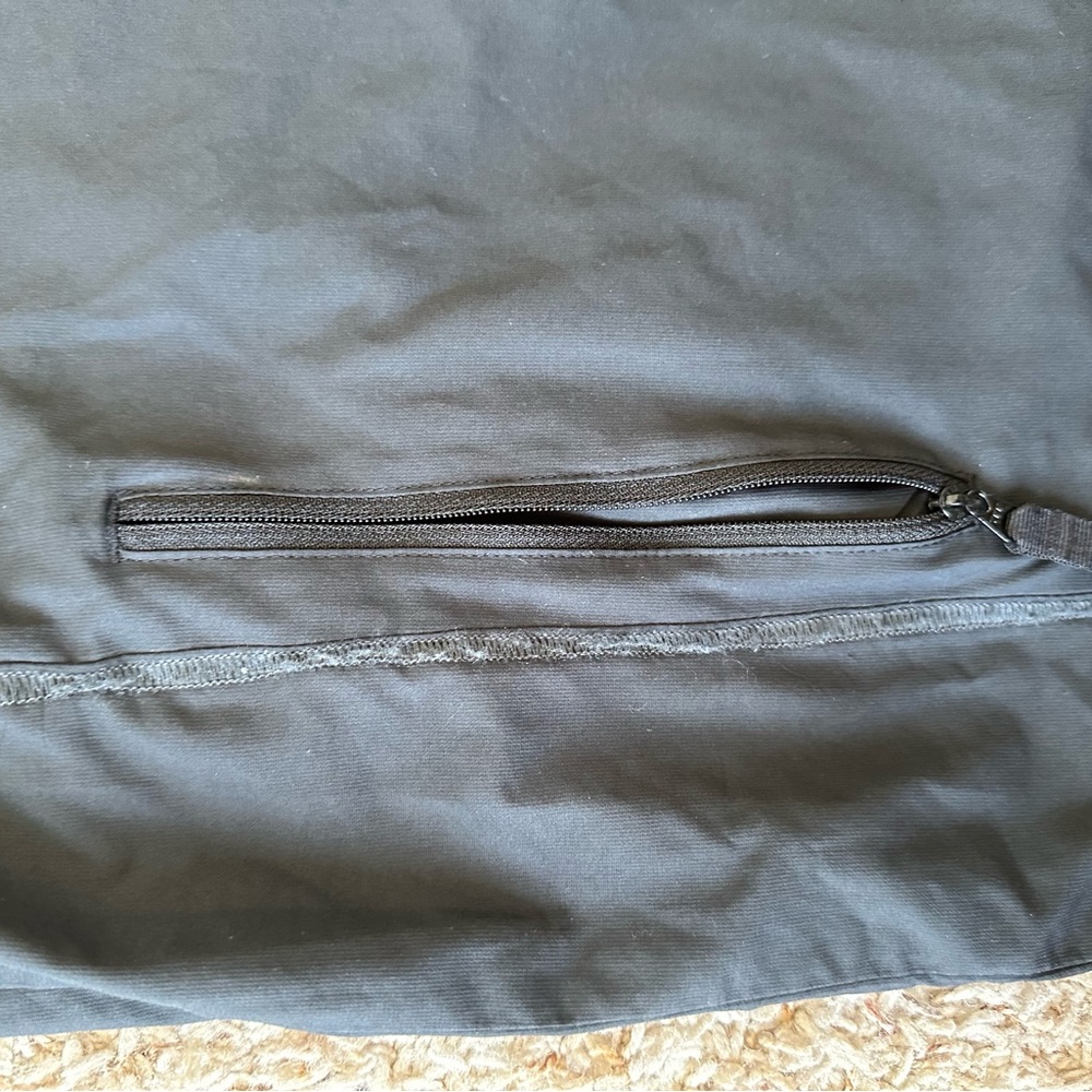 Nike Golf DriFit Quarter-zip Pullover. Black, water resistant material. - Picture 7 of 7